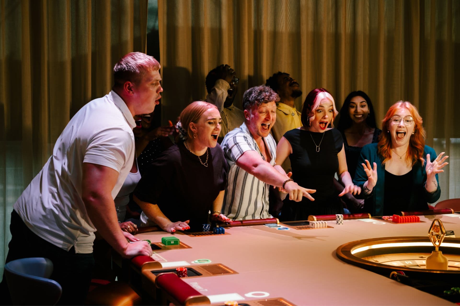 Guests at Revolver games table